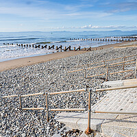Buy canvas prints of Railings and steps lead down to Barmouth beach by Jason Wells