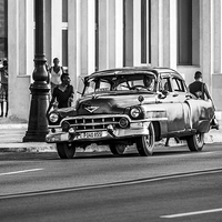 Buy canvas prints of  Classical car shugs along the Malecon by Jason Wells