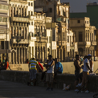 Buy canvas prints of  Locals gather on the seawall of Havana by Jason Wells