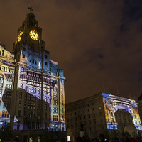 Buy canvas prints of  Light projections on the Three Graces by Jason Wells