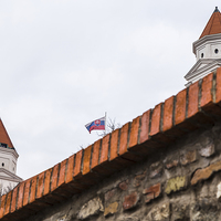 Buy canvas prints of National flag above Bratislava Castle by Jason Wells