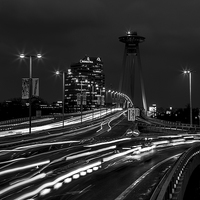 Buy canvas prints of  Traffic trails over the UFO Bridge at night by Jason Wells