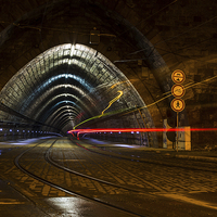 Buy canvas prints of Tram trails inside a tunnel in Bratislava by Jason Wells