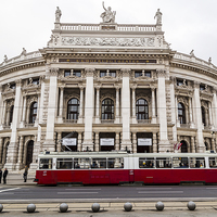 Buy canvas prints of Tram in front of the KK Hofburgtheater by day by Jason Wells