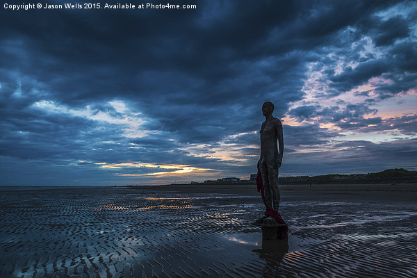 Colourful sky above the Iron Men at Crosby Picture Board by Jason Wells