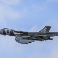 Buy canvas prints of Vulcan against a blue sky at Blackpool by Jason Wells