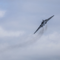 Buy canvas prints of Smoky Vulcan turns at Blackpool by Jason Wells
