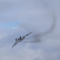 Buy canvas prints of Smoke trails behind the old Vulcan engines by Jason Wells