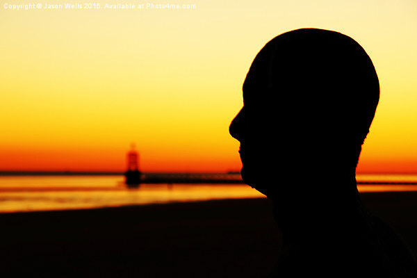 Silhouette of an Iron Man at sunset  Picture Board by Jason Wells