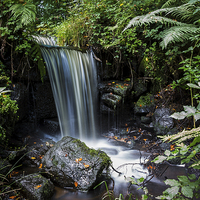 Buy canvas prints of Small waterfall in the countryside by Jason Wells