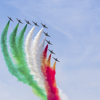 Buy canvas prints of Patriotic smoke from the Frecce Tricolori team by Jason Wells