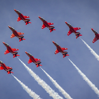 Buy canvas prints of Reds climbing into the sky by Jason Wells