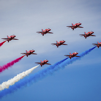 Buy canvas prints of Red Arrows in tight formation by Jason Wells