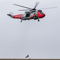 Buy canvas prints of Seaking performing a SAR demo at Southport by Jason Wells