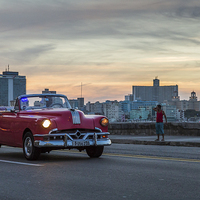 Buy canvas prints of Pink car on the Malecon by Jason Wells