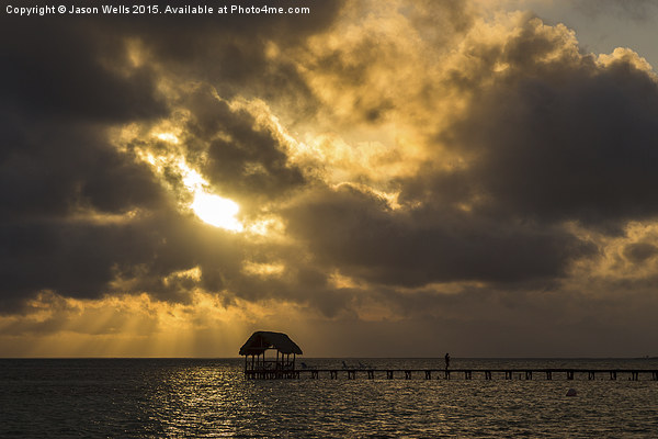Rays of sun above a jetty Picture Board by Jason Wells