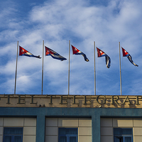 Buy canvas prints of Five Cuban flags by Jason Wells
