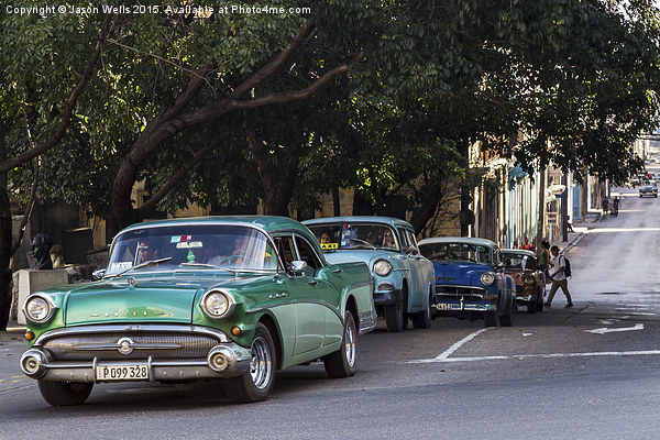 Vintage cars in Havana climbing a hill Picture Board by Jason Wells