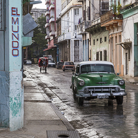Buy canvas prints of Car passing El Mundo bar by Jason Wells