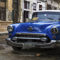 Buy canvas prints of Blue old timer parked up by Jason Wells