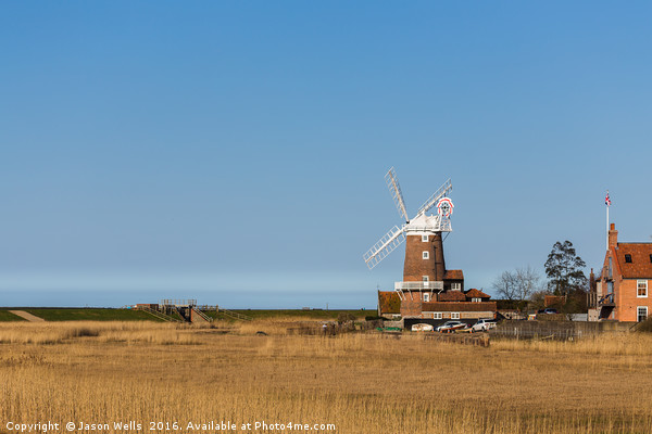 Cley Windmill next to the Salt marshes Picture Board by Jason Wells