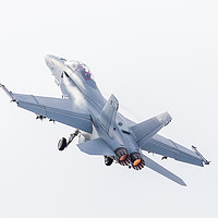 Buy canvas prints of F/A-18 Super Hornet from the US Navy lifting into  by Jason Wells