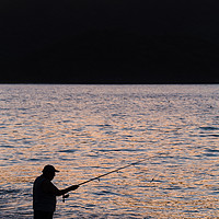 Buy canvas prints of Silhouette of a tico fishing by Jason Wells