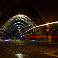 Buy canvas prints of Tram entering a tunnel by Jason Wells
