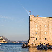 Buy canvas prints of St John’s Fortress lit up by golden sunlight by Jason Wells