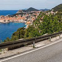 Buy canvas prints of Meandering coastal road towards Dubrovnik by Jason Wells