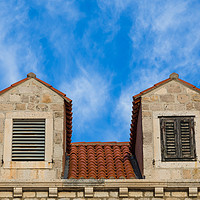 Buy canvas prints of Looking upward at the Dubrovnik architecture by Jason Wells