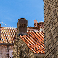 Buy canvas prints of Looking up at Dubrovnik's colourful buildings by Jason Wells