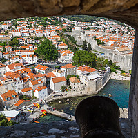 Buy canvas prints of Cannon faces inland at Dubrovnik by Jason Wells