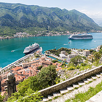 Buy canvas prints of Kotor surrounded by fortifications  by Jason Wells