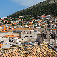 Buy canvas prints of Overlooking the bells on a church towards the old  by Jason Wells