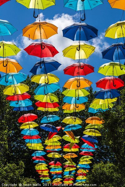 Rainbow of umbrellas hanging in Liverpool fade int Picture Board by Jason Wells