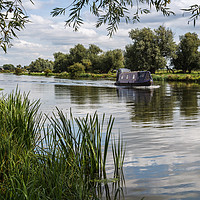 Buy canvas prints of Outskirts of Ely on the River Great Ouse by Jason Wells
