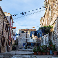 Buy canvas prints of Pretty courtyard in Dubrovnik's old town by Jason Wells