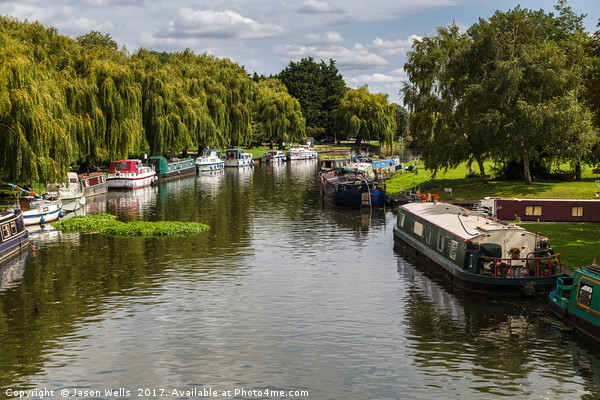 Boats line the river side of the River Great Ouse Picture Board by Jason Wells