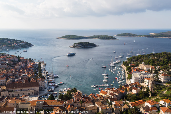 Yacht-dotted inlet of Hvar old town Picture Board by Jason Wells