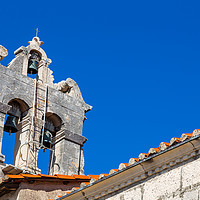 Buy canvas prints of Three bells above a church by Jason Wells