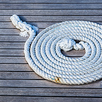 Buy canvas prints of Rope neatly left on a boat by Jason Wells