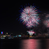 Buy canvas prints of Colourful fireworks above the Liverpool skyline by Jason Wells