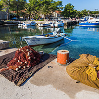 Buy canvas prints of Fishing nets drying out at Loviste by Jason Wells