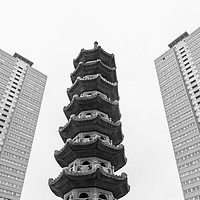Buy canvas prints of Chinese pagoda between two old blocks of flats by Jason Wells