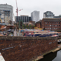 Buy canvas prints of New buildings being erected around the old canal i by Jason Wells