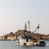 Buy canvas prints of Fishing boat in Rovinj harbour by Jason Wells