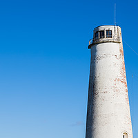 Buy canvas prints of Leasowe Lighthouse against a blue sky by Jason Wells