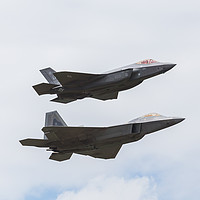 Buy canvas prints of F-35A and F-22A stealth fighters by Jason Wells
