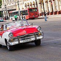 Buy canvas prints of Red and white convertible on the Prado by Jason Wells